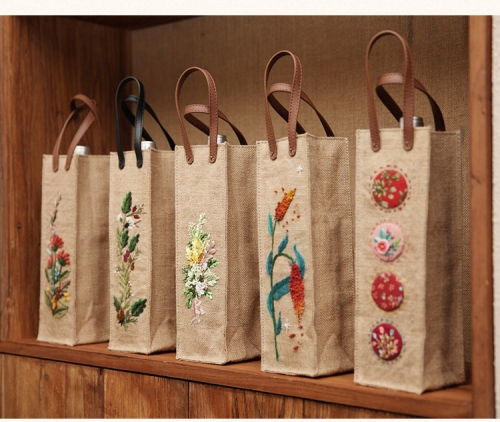Yellow linen embroidered wine bag with PVC handle
